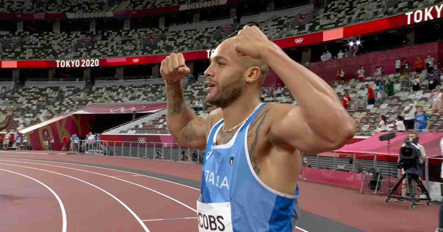Lamont Marcell Jacobs celebrates winning Tokyo 2020 men's 100m