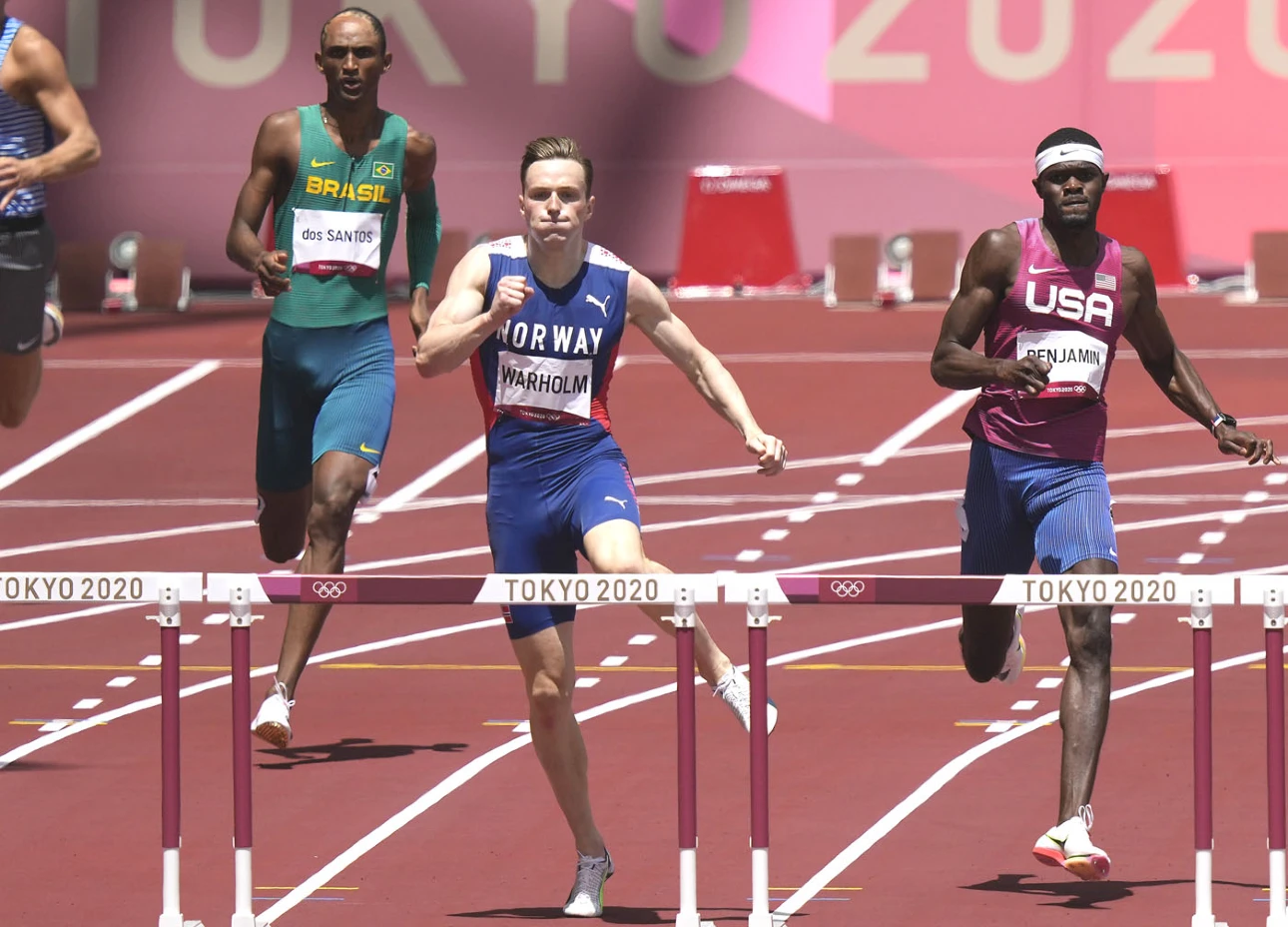 Karsten Warholm with Rai Benjamin and Alison dos Santos in the men's 400m hurdles at the Tokyo Olympics