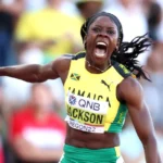 Shericka Jackson celebrates winning the women's 200m World Athletics Championships 2022 title