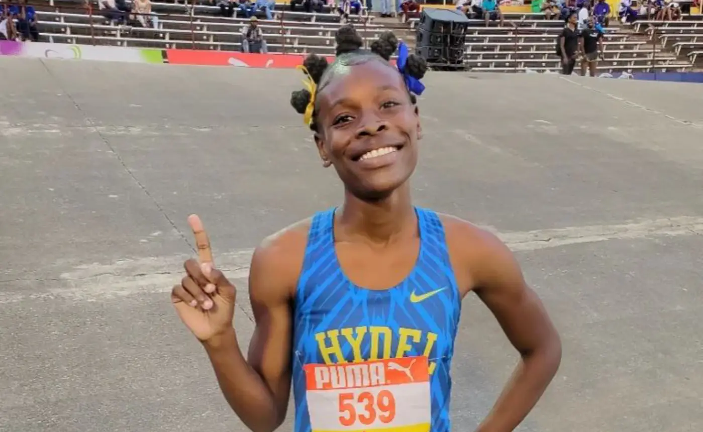 Alana Reid of Hydel High School wins the 100m title at Champs 2023