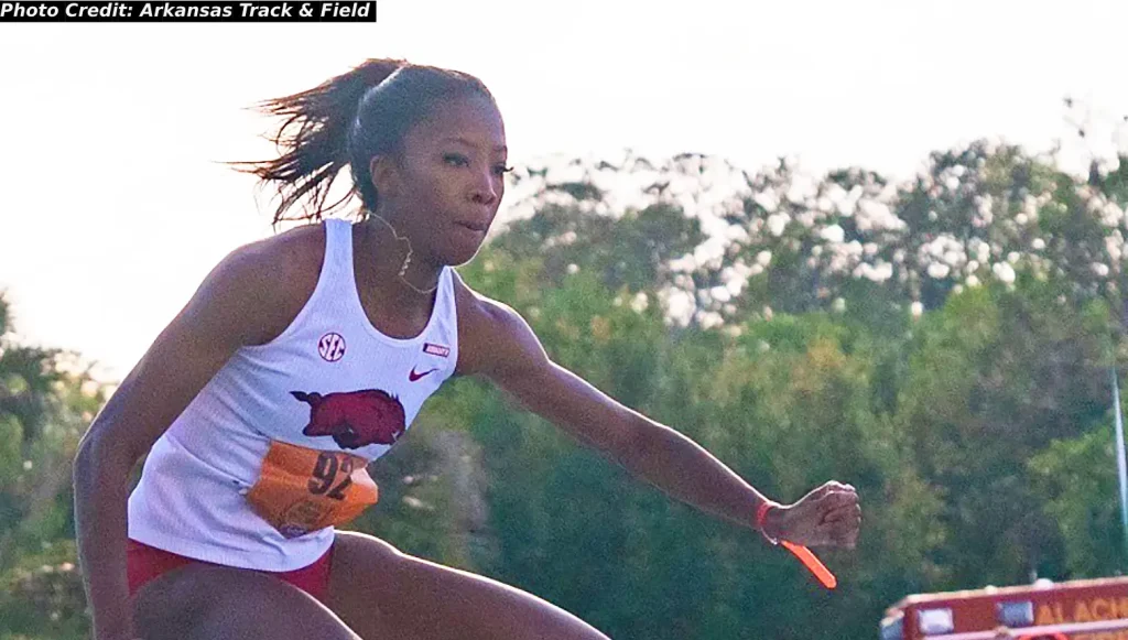 Britton Wilson in action the women's collegiate 400m hurdles