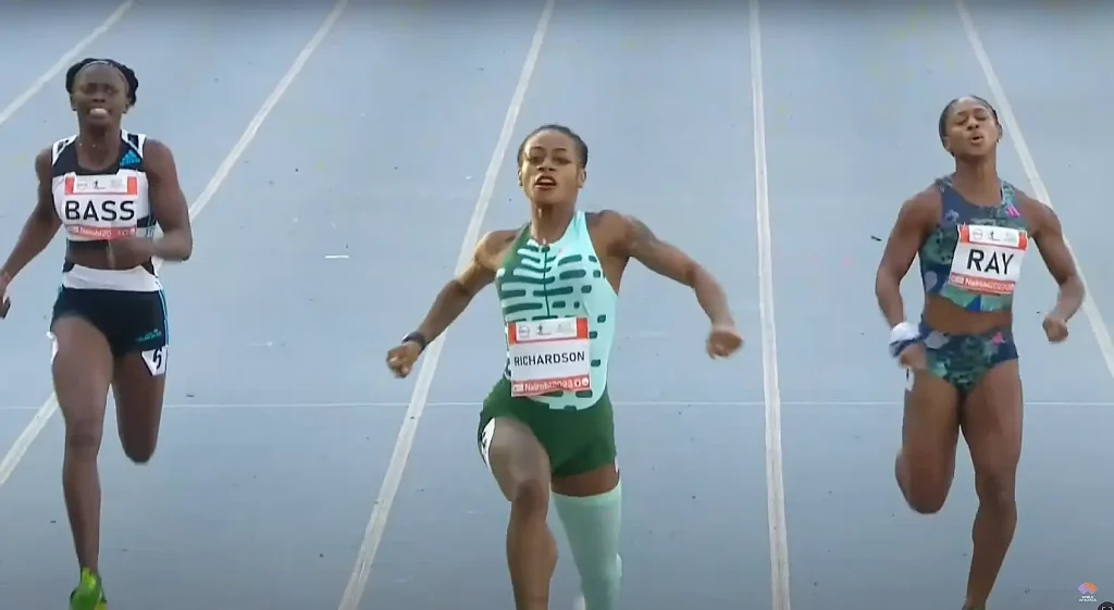 Sha'Carri Richardson celebrates winning the 200m