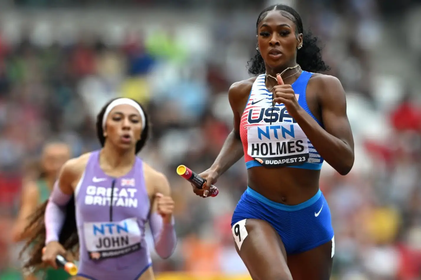 Alexis Holmes of USA in Heat 2 of the mixed 4x400m Relay