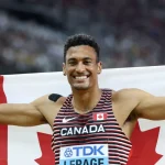 Pierce Lepage of Canada celebrates winning the men's Decathlon world championships gold medal