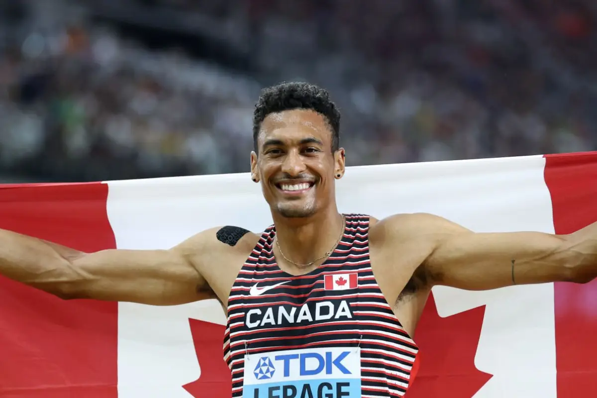 Pierce Lepage of Canada celebrates winning the men's Decathlon world championships gold medal