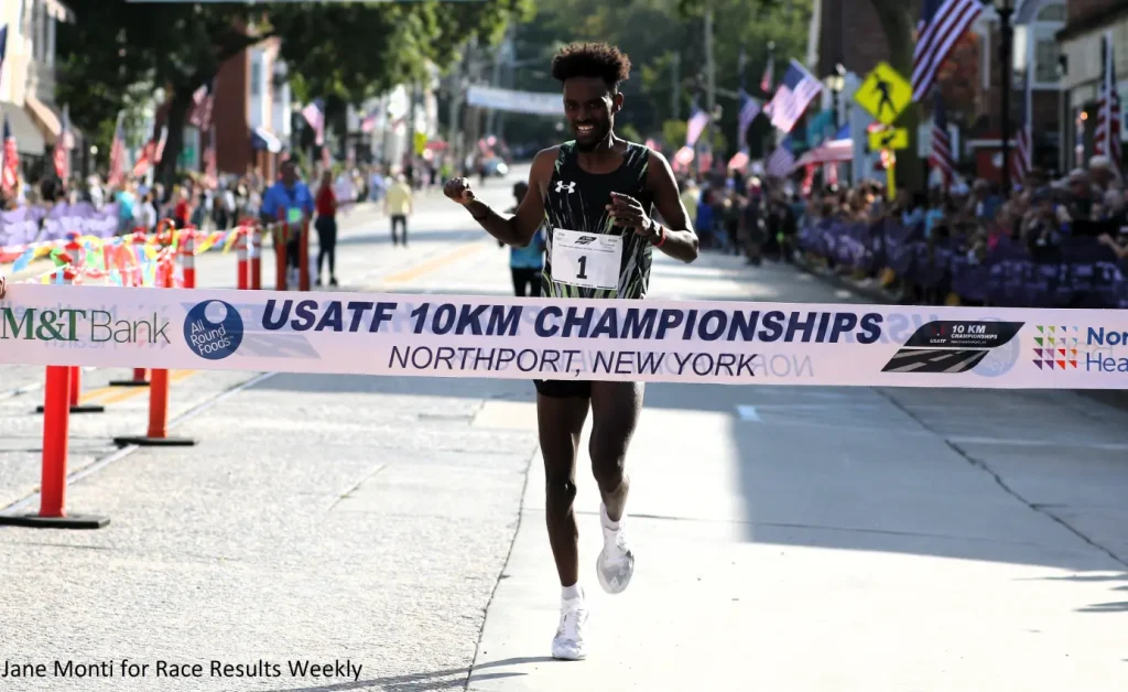 Biya Simbassa wins the USATF 10K title at the Great Cow Harbor 10K