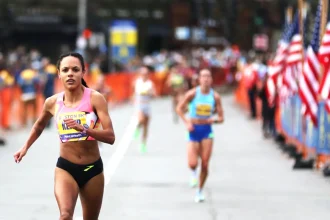 Erika Kemp finishing fifth at the 2024 Boston 5K