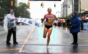 Molly Born winning the 2025 Delightful Run for Women 5-K