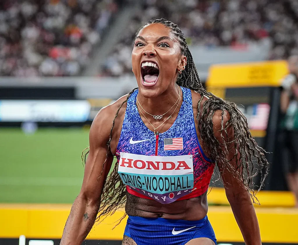 Tara Davis-Woodhall reacts after a big jump in the women's long jump at Tokyo 25.