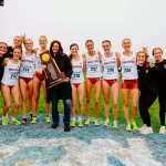 NC State women celebrate after winning the 2025 NCAA cross country 2025.
